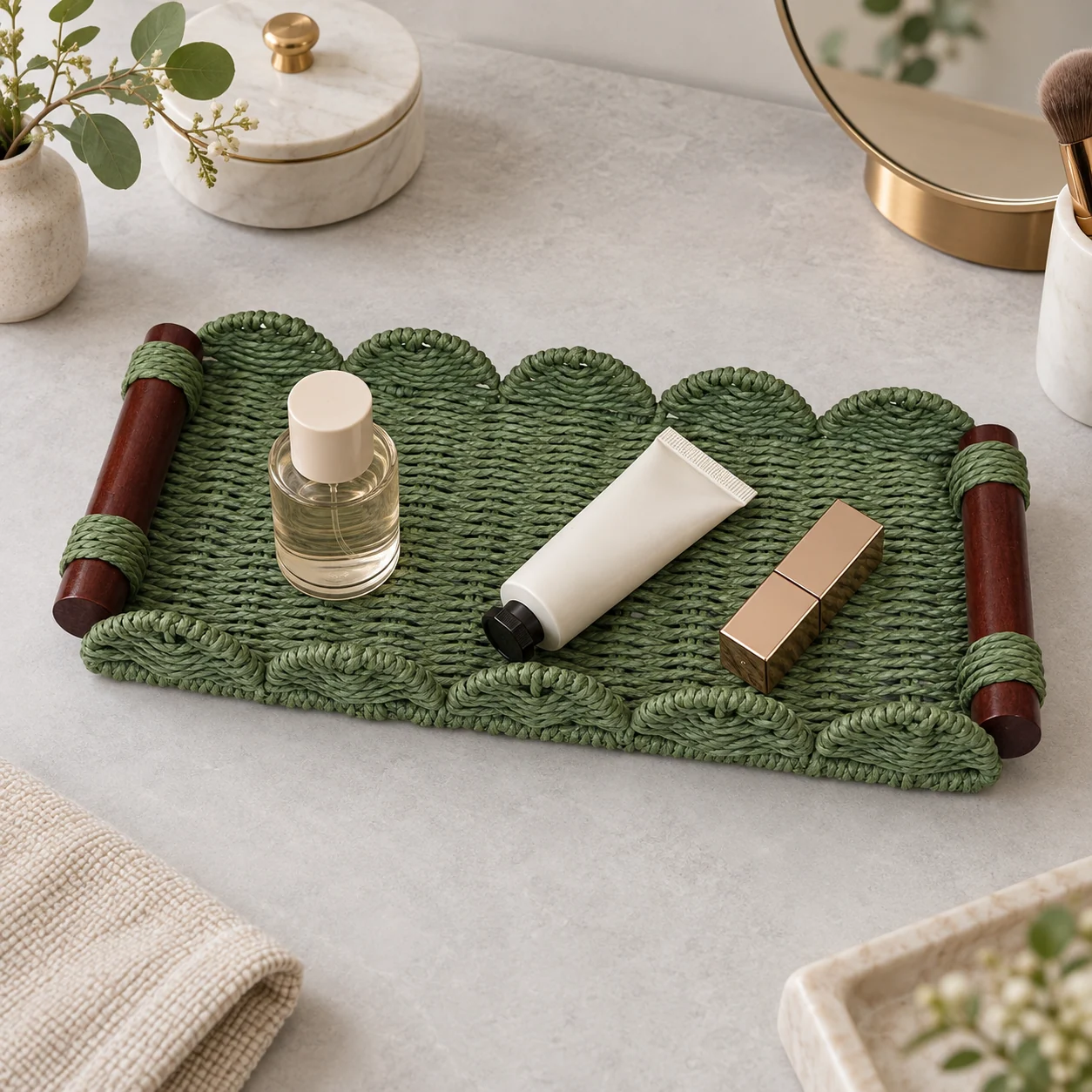 Green tray organizing capped cosmetics on a dry vanity